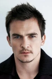 Rupert Friend as Bathurst 1985